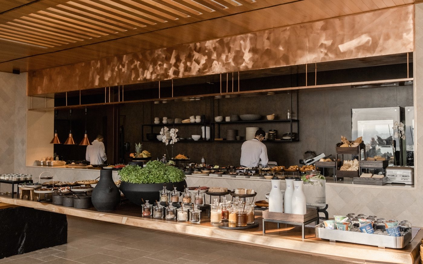 Breakfast buffet spread on a hotel table