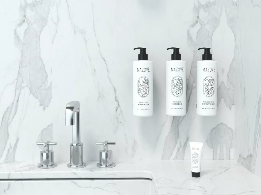 Wall-mounted amenity dispensers