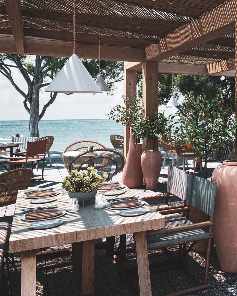 Seaside restaurant terrace under a pergola